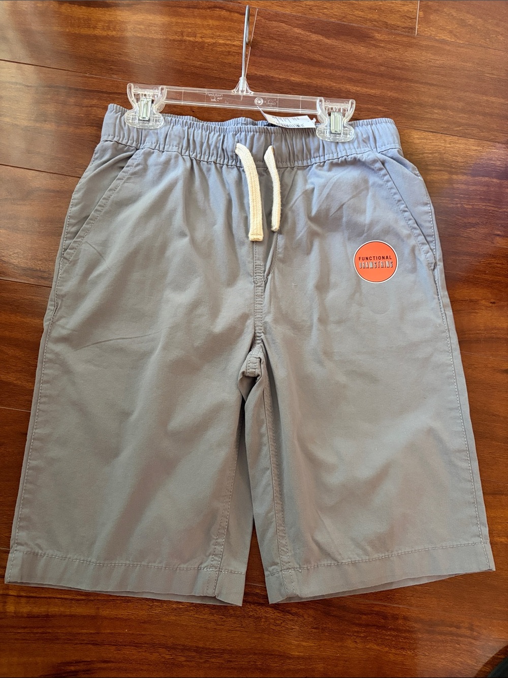 The Children's Place Light Gray Drawstring Shorts with Orange Patch